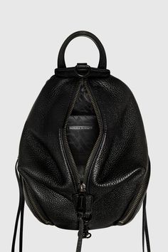 A scaled-down, versatile version of the Julian Backpack, the Convertible Mini Julian Backpack combines style with practicality. Crafted from supple leather accented with black shellac hardware and secured with a zip closure, it features exterior pockets to keep your essentials at close reach. Style #: HF23MMJBKP 100% Genuine Leather Black Shellac Hardware 8. 5"" W X 9"" H X 4"" D Handle Drop: 3"" Zip Closure 1 Exterior Slip Pocket 2 Exterior Zip Pockets 1 Interior Card Pocket Imported The photos Black Shellac, Backpack Bag, Shoe Size Conversion, You Bag, Rebecca Minkoff, Backpack Bags, Convertible, Zip Pockets, Genuine Leather