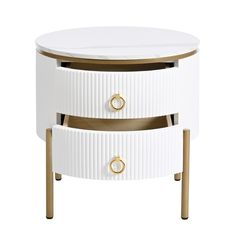 the white and gold side table has two drawers on each side, with one drawer open