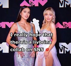 two women standing next to each other in front of a wall with the words i really hope that there's a livbina colab on s