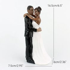 a bride and groom figurine are shown with the measurements for each item in front of them