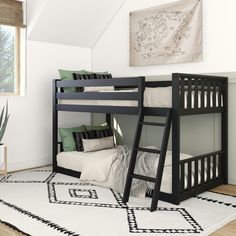 there is a bunk bed with a ladder on the bottom and a rug underneath it