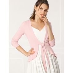 This tie-front cardigan for a casual look features long sleeves with a solid color. This ribbed and stretch cardigan gives the perfect balance to longer layers in a waist-defining cut with a tie front. This playful little sparkly cardigan for women is perfect for every outfit. Paired well with a pretty dress or jeans to complete the stylish look. Long Sleeve Shrug, Cardigan Pink, Crop Cardigan, Rib Knit Cardigan, Long Sleeve Knitted Cardigan, Shrug Cardigan, Tie Front Cardigan, Women's Tie, Ruffle Long Sleeve