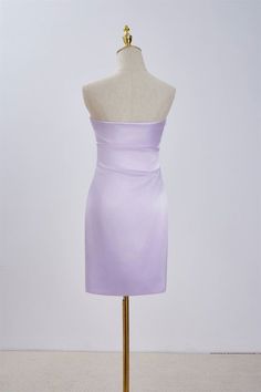 The strapless lavender tight short dress is made of luxurious satin, with a vibrant color that catches the eye. Its bodycon silhouette and crepe neck embellishment give it a sleek and sophisticated look. The dress features a side zipper for easy wear and falls above the knee for a flattering fit. Item #NP1114 Material: Satin Color: Lavender Silhouette: Bodycon Embellishment: Crepe neck Neck: Strapless Back: Side zipper Length: Above knee length Fully lined: Yes Built-in bra: Yes True to size. Made in China. Dresses are usually packed inside out for protection. Hand wash Evening Purple Strapless Bodycon Dress, Evening Strapless Purple Bodycon Dress, Purple Strapless Evening Bodycon Dress, Strapless Purple Bodycon Evening Dress, Elegant Purple Bodycon Cocktail Dress, Elegant Lavender Mini Dress For Evening, Lavender Strapless Fitted Mini Dress, Elegant Lavender Mini Dress For Cocktail, Fitted Strapless Lavender Mini Dress