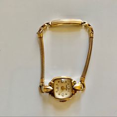 Gorgeous Vintage Palomar Watch With Expandable Snap Closure. Brass Metal And Rhinestone Face. This Watch Is A Vintage Gem. Definitely In Need Of A New Battery If You Want To Actually Use This. Also Such A Cute Accessory And Doesn’t Have To Function As A Watch. Very Dainty And Sweet. Will Come In A Pouch Or Box. From A Pet-Free, Smoke-Free Home. Dainty Vintage Watch, Rhinestone Face, Accessories Vintage, Brass Metal, Wrap Watch, Vintage Accessories, Accessories Watches, Snap Closure, Women Accessories