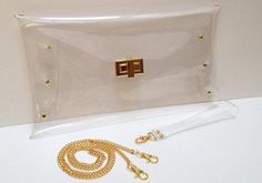 It is very nice design .Each bag is hand cut and carefully to make it by Hand.100 % handmade .It is very nice clutch, purse for your party and every day.It is a see through bag .Easy to find everything in your bag. **You can select the color and material Nickel or gold color of accessory**-Material: Made by Clear Vinyl in High Quality and Very good accessory. -Country of Origin: Made in Thailand-Size Approx. W 19.5x L 36 x D 2.5 cm.(Over Size)(W7 3/4"xL14 1/4 "xD1")-The Length of string Chain is Transparent Purse, Clear Clutch, Perfect Purse, Bag With Chain, Clear Bag, Over Size, Metal Accessories, Clear Bags, Clear Vinyl