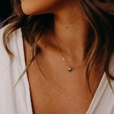 Created with Shogun. Our dainty Peridot Necklace is part of our new Birthstone Necklace Collection! This beautiful, yet delicate necklace is made with top-quality, genuine Peridot. The August Birthstone represents independence + power. The Peridot stone is emerald cut and faceted to ensure it sparkles from every angle. This beauty is perfect to gift to someone special, or treat yourself! It deserves to be worn every day. FEATURES Genuine Peridot stone (measures 7mm x 9mm) Choice of yellow gold f Necklaces Butterfly, Earrings Bold, August Birthstone Necklace, Peridot Birthstone, Dainty Diamond Necklace, Necklace Birthstone, Jewelry Aesthetic, Bold Rings, Peridot Necklace