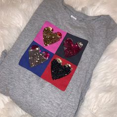 Gap Sparkly Heart Shirt Valentine’s Day Fits Like M/L- Like A Size 6-8. Sleeves Are Just Long. Gray Long Sleeve Shirt Guc For Some Spots On Sleeves At The Ends . . . *Brands For Exposure:* Rylee + Cru, Nordstrom, H&M, Splendid, Boden Baby, Gap, 7 For All Mankind, Zara, Crewcuts, Tucker And Tate, Vans, Mini Boden, Vans, Mini Boden, Lucky Brand, Trary, Miniolie, Janie And Jack, Smallable, Pp, Mini Melissa, Childrenchic, Maisonette, H&M, Mini Rodini, Boden, Nordstrom, Splendid, Janie And Jack, Gap, Cute Gap Cotton T-shirt, Gap Pink Crew Neck Top, Playful Gap Short Sleeve T-shirt, Cute Gap Crew Neck Top, Cute Short Sleeve Gap Tops, Playful Gap Tops For Playtime, Playful Short Sleeve Tops With Heart Print, Trendy Pink Tops For Playtime, Cute Crew Neck Top With Heart Patch