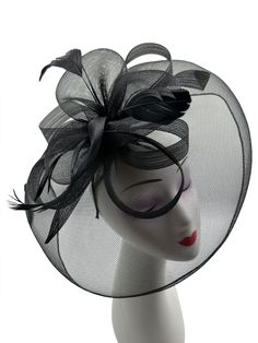 A Brand New Handmade black Colour Fascinator With mesh Curls forming a beautiful flower which sits in the middle of loops and feathers, thus making a beautifully crafted Large fascinator. PLEASE NOTE that we try our very best to match the colour of the fascinator to the photos, however, due to different pixel resolutions and Brightness/darkness settings on your phone screen, tablets and pcs, the colour of the shade may slightly look different. The length of the fascintor is approximately 32cm an Black Summer Wedding Headpieces, Black Spring Party Headpiece, Black Headpieces For Spring Party, Spring Party Black Headpieces, Black Headpiece For Spring Wedding, Black Summer Evening Fascinator, Black Headpieces For Spring Races, Black Headpieces For Races In Spring, Black Summer Church Fascinator