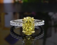 Yellow Oval Hidden Halo Engagement Ring Luxury Yellow Pear-shaped Ring, Elegant Yellow Pear-shaped Diamond Ring, Yellow Diamond Pear-shaped Ring, Yellow Pear-shaped Diamond Rings, Pear-shaped Yellow Diamond Ring For Wedding, Yellow Oval Diamond Ring Fine Jewelry, Yellow Oval Diamond Ring, Fine Jewelry, Formal Yellow Diamond Ring With Brilliant Cut, Fine Jewelry Yellow Oval Diamond Ring