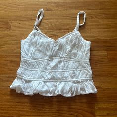 This Is Brand New, Still With A Tag! It Is Very Flattering With Ruffles Around The Bottom All Around. No Padding, Flattering Neckline And True To Size! Hollister Tank Tops, White Halter Top, Boho Tie Dye, Black Crop Top Tank, Black Cropped Tank, Strappy Tank Tops, Red Boho, Tie Dye Tank Top, Flowy Tank Tops