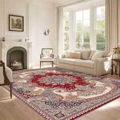 a living room filled with furniture and a red rug