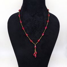 22kt yellow gold handmade charm necklace with 18-carat red ruby stone charm delicate jewellery. Metal-22kt yellow gold. Item type- Necklace. Length-18 inches to 26 inches. Ruby size-7 mm approx. Stamped-22kt hallmarked. Stone-ruby. Gross weight-20.770 grams for 18". Stone weight-18 carats(for 18")  Makes excellent giftng or collectible items. Fine Jewelry Ruby Gift, Red Pendant Gold-plated Jewelry, Red Gold Plated Pendant Jewelry, Red Pendant Jewelry In Gold Plated, 22k Yellow Gold Kundan Necklace As Gift, Yellow Gold Kundan Necklace With Gemstone For Gift, Yellow Gold Kundan Necklace With Gemstone, Yellow Gold Ruby Bead Jewelry, 22k Yellow Gold Kundan Necklace With Gemstone