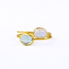 You'll love this ring combo set with your choice of natural gemstones. Available in bright sterling silver, 18k vermeil gold, or rose gold. Gemstone are approximately 5mm x 7mm in size. Open back setting. Band stamped with 925 on inside. If you plan stacking the rings on the same finger please choose one size up. METAL   ✦ 18K VERMEIL GOLD   ✦ ROSE GOLD   ✦ 925 STERLING SILVER Please note that we use alternative birthstones for some months and offer multiple birthstone options to select from for Minimalist Oval Cabochon Jewelry, Gold Sterling Silver Moonstone Ring As Gift, Handmade Yellow Gold Moonstone Ring In Sterling Silver, Yellow Gold Sterling Silver Opal Ring For Gift, Stackable Yellow Gold Gemstones For Gift, Fine Jewelry Birthstone Moonstone, May Birthstone Stackable Round Stone Jewelry, May Birthstone Stackable Jewelry, Fine Jewelry Stackable Gemstones As Gifts