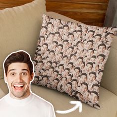 a pillow with an image of a man's face on it next to a couch