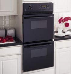 two ovens side by side in a kitchen