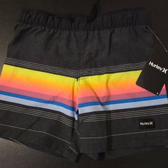 This Is A Pair Of Hurley Boys Pull Up Swim Shorts Size 4. These Swim Shorts Are New With The Original Tags. Playful Black Beach Shorts, Playful Black Bottoms For The Beach, Playful Black Shorts For Summer, Black Summer Playwear Bottoms, Playful Black Cotton Shorts, Multicolor Bottoms With Elastic Waistband For Playwear, Multicolor Playwear Bottoms With Elastic Waistband, Black Summer School Bottoms, Multicolor Short Bottoms For Playwear