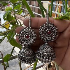 Luxury Silver Earrings For Diwali, Silver Temple Jewelry Earrings For Festivals, Red Sterling Silver Hoop Earrings, Red Sterling Silver Round Hoop Earrings, Festive Sterling Silver Earrings, Red Sterling Silver Jewelry For Festivals, Traditional Round Engraved Earrings, Traditional Engraved Round Earrings, Traditional Engraved Round Hoop Earrings