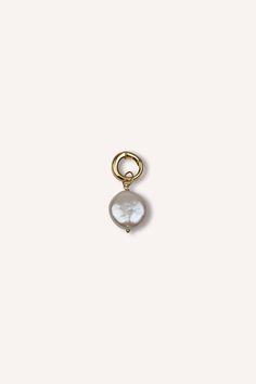 Add a splash of elegance to your collection with our Freshwater Disc Charm. Featuring a smooth, lustrous disc reminiscent of freshwater pearls, this charm embodies purity and grace. Its timeless design makes it a versatile addition to any bracelet, necklace, or anklet, and it can also be worn as a bikini charm, offering a touch of sophistication and natural beauty. Perfect for those who appreciate the serene allure of freshwater treasures. Details: Charm size: Approx: 1 x 1 inch 14k Gold Filled Materials Freshwater Pearls Demi Fine Jewelry, Pearl Charms, Bracelet Necklace, Anklets, Fresh Water, Freshwater Pearls, Timeless Design, Ideal Gift, Gold Filled