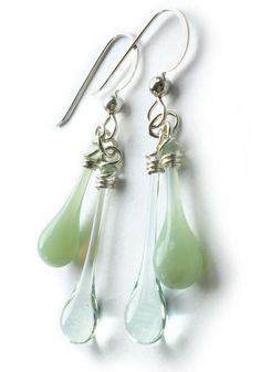 Recycled Greens Duet Earrings - glass Earrings by Sundrop Jewelry Modern Green Glass Earrings, Everyday Green Glass Jewelry, Minimalist Green Teardrop Earrings, Elegant Recycled Glass Earrings With Ear Wire, Green Teardrop Glass Jewelry, Green Wire Wrapped Long Drop Earrings, Modern Green Drop Jewelry, Nickel-free Teardrop Earrings In Recycled Glass, Nickel-free Teardrop Earrings Made Of Recycled Glass