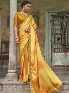 <ul>
<li style="text-align: justify;"><span data-preserver-spaces="true">Be an angel and create and ascertain a smashing effect on anybody by carrying this yellow satin trendy saree. The embroidered , sequines and lace work seems chic and fantastic for any occasion.</span></li>
<li style="text-align: justify;"><span data-preserver-spaces="true">Paired up this amazing look saree with similar yellow shade blouse in satin work with sequines and embroidery.</span></li>
<li style="text-align: justify Trendy Saree, Party Wear Sarees Online, Party Sarees, Yellow Saree, Yellow Satin, Satin Saree, Embroidery Saree, Trendy Sarees, Yellow Ties