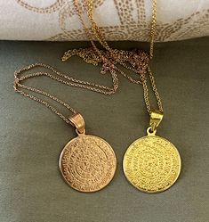 Buy an original Greek Pendant Gold Plated Phaistos Disk | Discover Greek Jewelry within a huge collection of Ancient Greek Jewelry | shipping worldwide This amazing piece of jewelry is representing the Ancient Greek Symbol so called Festos disc. Made of a mixing of silver 925 and 18k gold full filled plated.An excellent gift for women and also for men that would love to wear a geometric symbol. Ideal present for someone who have already spent time in this beatiful island or he comes from this. G Bronze Tarnish-resistant Medallion Necklace, Bronze Coin Pendant Necklace, Bronze Medallion Necklace With Coin Pendant As Gift, Symbolic Coin Necklace With Tarnish Resistant Round Pendant, Bronze Coin Pendant Medallion Necklace Gift, Bronze Round Amulet Necklace, Bronze Coin Necklace, Bronze Coin Pendant Necklace For Gift, Rose Gold Amulet Necklace With Round Pendant