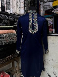 *2 Piece Navy Blue , Men's Neck  Embroidery Design  Kurta Set , White Multi Colour Embroidery Kurta Pajama Set. *Fabric: %100  Cotton Satin , Thick, Warm, Comfortable, Breathable, Softer, Satin Feeling *Center 4 Button With Zipper Regular Fit Pant  *This Suit Has A 6" Drop Which Is The Difference Between The Size Of The Sherwani & Pants. For Example, A 40r Jacket Includes A 34W Pant *Dry Clean Only Important Note: All Our Products Are Made To Order ! Please Contact Us For Perfect Fitting Suit. * Navratri Long Sleeve Salwar Kameez With Embroidered Border, Embroidered Churidar For Ceremonial Occasions, Blue Semi-stitched Churidar With Resham Embroidery, Embroidered Salwar Kameez For Eid, Semi-stitched Unstitched Suit With Embroidered Border, Transitional Chanderi Kurta With Dabka Work, Eid Intricate Embroidered Straight Kurta Bandhgala, Traditional Long Sleeve Churidar For Navratri, Fitted Churidar With Embroidered Border For Transitional Season