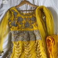 Yellow Embroidered And Bejeweled Salwar Kameez With Net Sleeves. I've Worn And Loved This Piece But Thought It Could Use A New Home. Pants Fit Like A Size Small And Top Is Medium/Large. Measurements: Gown Length: 132 Cm Gown Waist: 83 Cm Pant Waist: 80 Cm (There Is An Elastic Thigh Width: 58 Cm (Largest Opening) Embellished Yellow Sets For Diwali, Embellished Yellow Set For Diwali, Diwali Embellished Yellow Sets, Yellow Bollywood Dress With Traditional Drape, Festive Yellow Embellished Anarkali Set, Festive Yellow Embellished Dupatta, Party Wear Embroidered Anarkali Set For Festivals, Traditional Yellow Embellished Anarkali Set, Yellow Embellished Traditional Anarkali Set