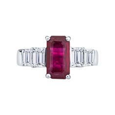 This elegant, sophisticated ring features a 2.40ct, emerald cut, natural Burma ruby (GIA Report #1172411353), with 1.30ct total weight in emerald cut natural diamonds accenting the sides. These stones are set in a platinum ring, which is currently a size 6.75, but may be resized upon request. Antique Promise Rings, Ruby Diamond Engagement Ring, Antique Ruby Ring, Ruby Wedding Ring, Wedding Ring Art, Ruby Ring Vintage, Ruby Wedding Rings, Wedding Rings Art, Wedding Ring For Her