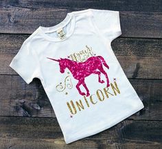 Be your own unicorn, make your own magic! This whimsical and inspiring tee is perfect for the princess in your life. Unicorn Shirts, White Short Sleeve Tops, Unicorn Girl, Unicorn Shirt, Glitter Print, Inspirational Shirt, Top T Shirt, Girls Birthday, Unicorn Party