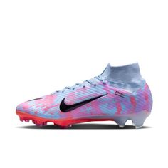 the nike vapor soccer shoe is shown in pink, blue and white with black accents