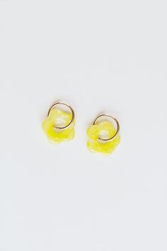 Flowers are our favorite part of spring, and what better way to be ready for spring than with some sweet flower earrings? Say hello to Primrose, our adorable acetate floral with a huggie hoop. A subtle nod to spring, Primrose is fun, casual, and the perfect accessory for all your activities. available in chartreuse: our opaque marbled electric lime colorway - acetate flower with huggie hoop earrings - hinged snap 14k gold filled closure - 1.25” length, .75” hoop diameter - hypoallergenic - nicke Trendy Hoop Earrings With Flower Charm For Spring, Trendy Everyday Flower Earrings, Spring Flower Earrings For Everyday Wear, Trendy Hypoallergenic Flower Earrings For Spring, Summer Flower Charm Hoop Earrings, Everyday Flower Earrings With Spring Charm, Trendy Flower Charm Earrings For Spring, Everyday Flower Charm Earrings For Spring, Everyday Flower Earrings With Charm For Spring