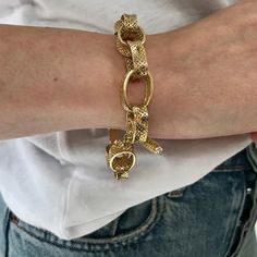 This crownwork® link bracelet is a classic piece for everyday wear. The bracelet sits comfortably on the wrist and works with every look. The clasp is our stylish and secure crownwork® toggle with diamonds studded at each end for that extra touch of luxury. A classic piece to be worn everyday. MATERIAL: 18k Yellow Gold DIMENSIONS: 8" Luxury Chain Link Jewelry With Toggle Clasp, Luxury Gold Chain Bracelet With Clasp, Luxury Everyday Jewelry With Toggle Clasp, Classic Gold Bracelet With Toggle Clasp, Luxury Link Chain Bracelet With Toggle Clasp, Elegant Oval Link Chain Bracelet With Toggle Clasp, Elegant Chain Bracelet With Toggle Clasp For Everyday, Chic Formal Jewelry With Toggle Clasp, Luxury Jewelry With Toggle Clasp And Link Shape