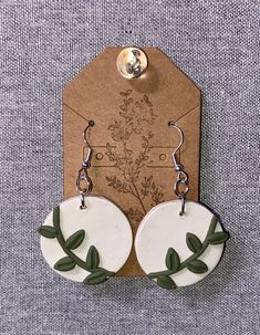 Sage green vines with a white background dangle earrings. White Leaf-shaped Earrings With Ear Wire, Nature-inspired White Drop Earrings, White Nature-inspired Drop Earrings, Handmade White Leaf-shaped Earrings, Botanical Green Drop Earrings, Handmade White Botanical Earrings, Green Botanical Drop Earrings, Long Turquoise Earrings, Chandbalis Earrings