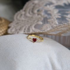 💎 Materials: Gold: 18k Gold Plated over Solid Sterling Silver Base Silver: Solid Sterling Silver Cubic Zirconia Synthetic Ruby 📐 Size: Adjustable Open Design - Size 5+ Ruby Birthstone Ring, Red Heart Ring, Ruby Heart Ring, Garnet Heart, Ruby Heart, Ruby Birthstone, Open Design, Gold Plated Rings, Wow Products