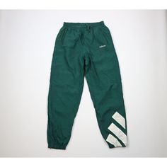 Vtg 90s Adidas Mens Medium Spell Out Big Logo Lined Nylon Joggers Pants Green Mens Pants Blemishes front right, waistband, back left. Inner bottom lining is ripped and has blemishes Mens size Medium Measurements are: 14 inches across the waist laid flat 32 inch inseam 43 inches from top to bottom Green Nylon US Shipping is FREE Canada is $15 and International is $24 Check out my other items in my store! PR1491 Green 90s Style Streetwear Bottoms, Sporty Green Full-length Parachute Pants, Green Sporty Parachute Pants, Retro Green Bottoms For Streetwear, Green Retro Bottoms For Streetwear, Green Nylon Parachute Pants For Streetwear, 90s Style Nylon Sports Pants, 90s Style Sports Pants With Pockets, 90s Nylon Parachute Pants For Streetwear