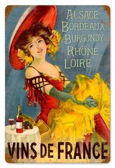 a vintage french wine label featuring a woman in a red dress with a yellow hat