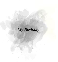 a black and white photo with the words my birthday written on it, in front of an ink blotch