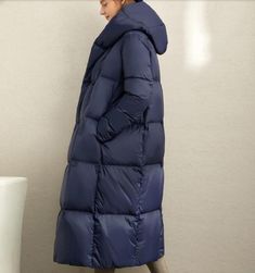 This down coat make with 90% duck down ,very warm in the winter .also could be custom made for any size. This is a winter down jacket fill with down.we design it with a very thick and warm style.this hooded down jacket could keep you very warm in the cold winter.the side pockets is very useful.a unique design women winter coat. Material: 90% duck down ,polyester Style: Casual Package Contents: 1 x down coat S:Length:110cm chest:106cm shoulder:39 cm sleeve:60cm M:Length:110cm chest:110cm shoulder Winter Coats Women Casual, Triathlon Clothing, Autumn Outwear, Winter Coat Parka, Long Down Coat, Winter Puffer Coat, Look Casual Chic, Winter Attire, Minimalist Capsule Wardrobe