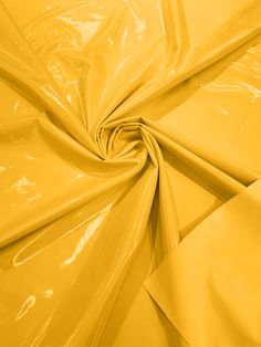 yellow plastic sheeting is shown in close up view, as well as the background