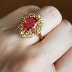 New 18k Gold Plated Over 925 Silver Filled Oval Cut Ruby Diamond Ring For Women Stamped 925. All Gemstones Are Simulated. A Jewelry Box Included. Ready To Ship Same Day. Feel Free To Ask Any Question. All Photos Are Real Time From Actual Object No Stock Photo Used. Color Might Be Slightly Different Due To Lighting. Classic Gold Ruby Ring With Cubic Zirconia, Oval Ruby Ring In Cubic Zirconia Fine Jewelry, Exquisite Oval Ruby Promise Ring, Exquisite Oval Ruby Ring With Center Stone, Oval Ruby Ring With Diamonds In Gold, Oval Ruby Jewelry With Halo Design, Elegant Oval Ruby Ring With Halo, Elegant Oval Halo Ruby Ring, Luxury Gold Ruby Ring With Halo Design