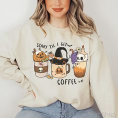 "Scary Til I Get Coffee Sweatshirt, Pumpkin Sweatshirt, Halloween Sweatshirts, Halloween Sweater, Halloween Clothes, Halloween Shirt, Halloween Crewneck, Halloween Women's Sweatshirt These sweatshirts are so soft and comfortable! They are perfect to wear this Halloween season!  For an oversized look, order a size or two up from your normal size. Materials: 50% cotton, 50% polyester Medium-heavy fabric (8.0 oz/yd² (271.25 g/m Loose fit Sewn-in label Runs true to size Sizing: These are unisex sweatshirts so they fit a bit looser than women's sweatshirts. Please refer to the size chart image in the listing. I recommend taking one of your favorite sweatshirts and measuring it while it's laying flat. Our size chart measurements are taken while lying flat, not a circumference measurement. SMALL: Momma Sweatshirt, Halloween Customs, Sweatshirt Ideas, Halloween Clothes, Coffee Sweater, Pumpkin Sweatshirt, Halloween Crewneck, Halloween Tattoo, Pumpkin Sweatshirts