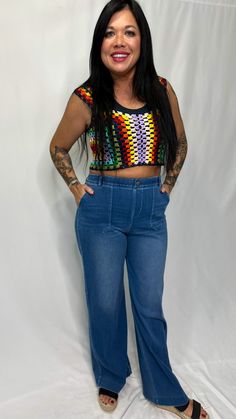 Summer is calling your name! A multi-colored crocheted top with eyelets on it. This can be worn as a cover up, with a shirt underneath, or as is! Fit: True to size Small/medium:4-8 Medium/ large: 8-12 The model is wearing a size small/medium. Trendy Multicolor Cotton Knit Top, Multicolor Knit Casual Tops, Casual Multicolor Knit Tops, Trendy Multicolor Short Sleeve Knit Top, Multicolor Short Sleeve Knit Top For Summer, Trendy Multicolor Knit Top For The Beach, Casual Multicolor Short Sleeve Knit Top, Trendy Multicolor Knit Top For Beach, Multicolor Bohemian Knit Top For Spring