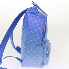 Brand: Louis Vuitton Model: Color: Blue Material: Canvas Inclusions: Dust Bag / Name Tag Dimensions: W30cm x H37cm x D15cm Serial number: NA Condition: A - excellent condition. The Louis Vuitton Cloud Backpack is a stylish and versatile accessory in classic blue Monogram canvas. This backpack combines fashion with functionality, making it perfect for everyday use. The exterior features the iconic Monogram canvas, while the interior offers ample space for your belongings. The backpack is designed Bag Name Tag, Louis Vuitton Backpack, Bag Names, Backpack Bag, Blue Canvas, Canvas Backpack, Classic Blue, Name Tag, Monogram Canvas