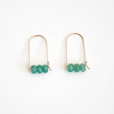 14k gold filled hoop earrings with gemstones. These earrings are so simple and minimal that they will fit any style. Every single piece is handmade by me, so a shape may be slightly different from each other. These earrings will be made for you after the order is placed. MATERIALS14k gold filled wireGreen Aventurine DIMENSIONSapprox. 1/2" (15mm) width x 1" (25mm) length Cold Connections, Silversmithing Jewelry, Minimalist Earrings Gold, Bar Jewelry, Gold Leaf Earrings, Minimal Earrings, Gold Filled Hoops, Circle Earrings Studs, Tiny Stud Earrings