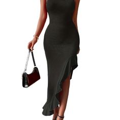 a woman in a black dress holding a purse