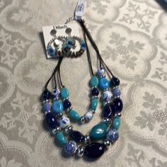 Gorgeous Beads In 3 Strands And Ringed Earrings With Posts. Beads Are In Blue, Turquoise And Some Are White With Blue Floral Design. Fun To Wear. New Blue Floral Design, Jewelry Beaded, Necklace And Earrings, Blue Turquoise, Strand Necklace, Blue And Silver, Blue Floral, Womens Jewelry Necklace, Beaded Jewelry