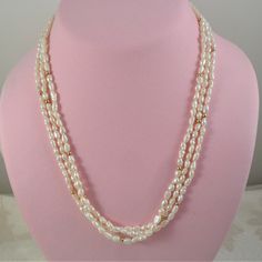 "Lovely necklace features multi strands of lustrous rice pearls that accented with small gold beads, and a 14K gold clasp. It measures 20\" Excellent condition" Victorian Jewelry Necklace, Light Weight Gold Jewellery, Rice Pearl Necklace, Small Pearl Necklace, Pearls Jewellery, Rice Pearls, Bridal Jewellery Design, Pearl Jewelry Design, Pearl Necklace Designs