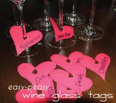 wine glass tags with the words easy peas written on them in pink and black ink