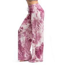 Embrace unparalleled comfort and unique style with our cloud-inspired, signature soft lounge pants from the Dyes The Limit Collection. Each piece is a testament to individuality, featuring 100% hand tie-dyed patterns that guarantee no two pairs are alike, offering you an exclusive addition to your wardrobe. A wide-leg fit and our signature soft stretch fabric ensures maximum comfort whether you're lounging at home, embarking on a lazy morning, or settling in for a cozy night. With a comfy elasti Spring Relaxed Fit Tie-dye Pants, Tie Dye Harem Pants, Soft-washed Tie Dye Tops For Loungewear, Tie-dye Stretch Bottoms For Loungewear, Relaxed Fit Tie-dye Bottoms With Pockets, Soft Pajama Pants, Summer Tie-dye Yoga Pants, Womens Pjs, Lounge Pajamas