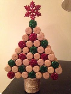 a wine cork christmas tree with red and green decorations